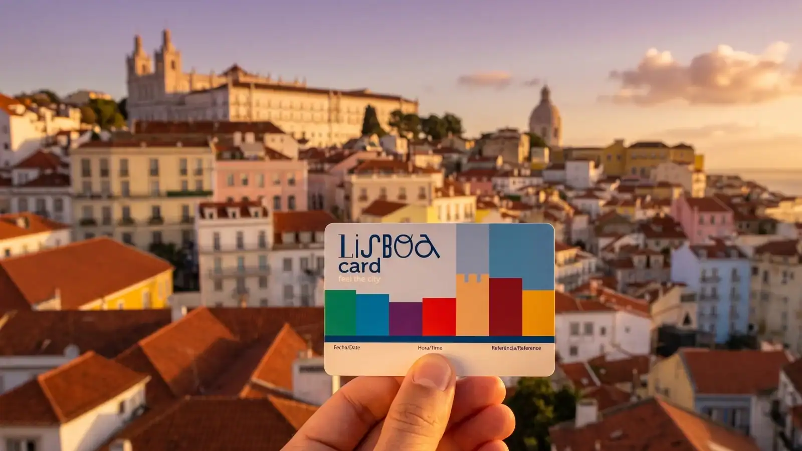 The Lisboa Card in front of the Lisbon skyline with the Tagus, Castelo de São Jorge and the 25 de Abril Bridge at sunset